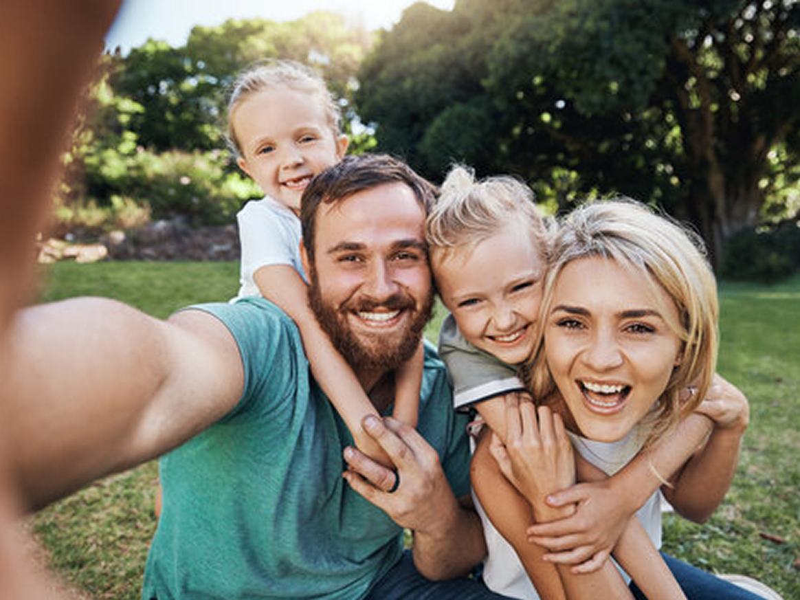 Happy family sharing memories on StoriOUT